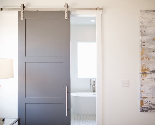 Porte scorrevoli per interno con binario esterno in acciaio